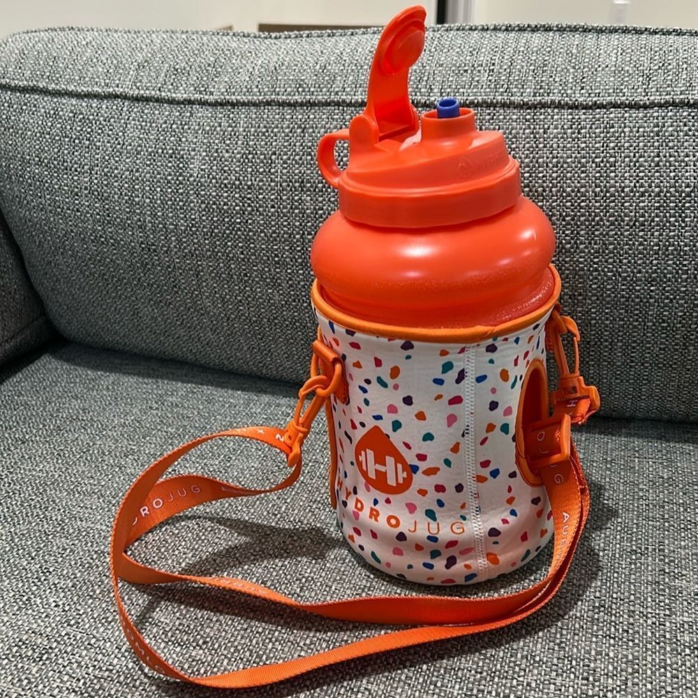 Like new Hydrojug water bottle - orange with carrying sleeve and straw